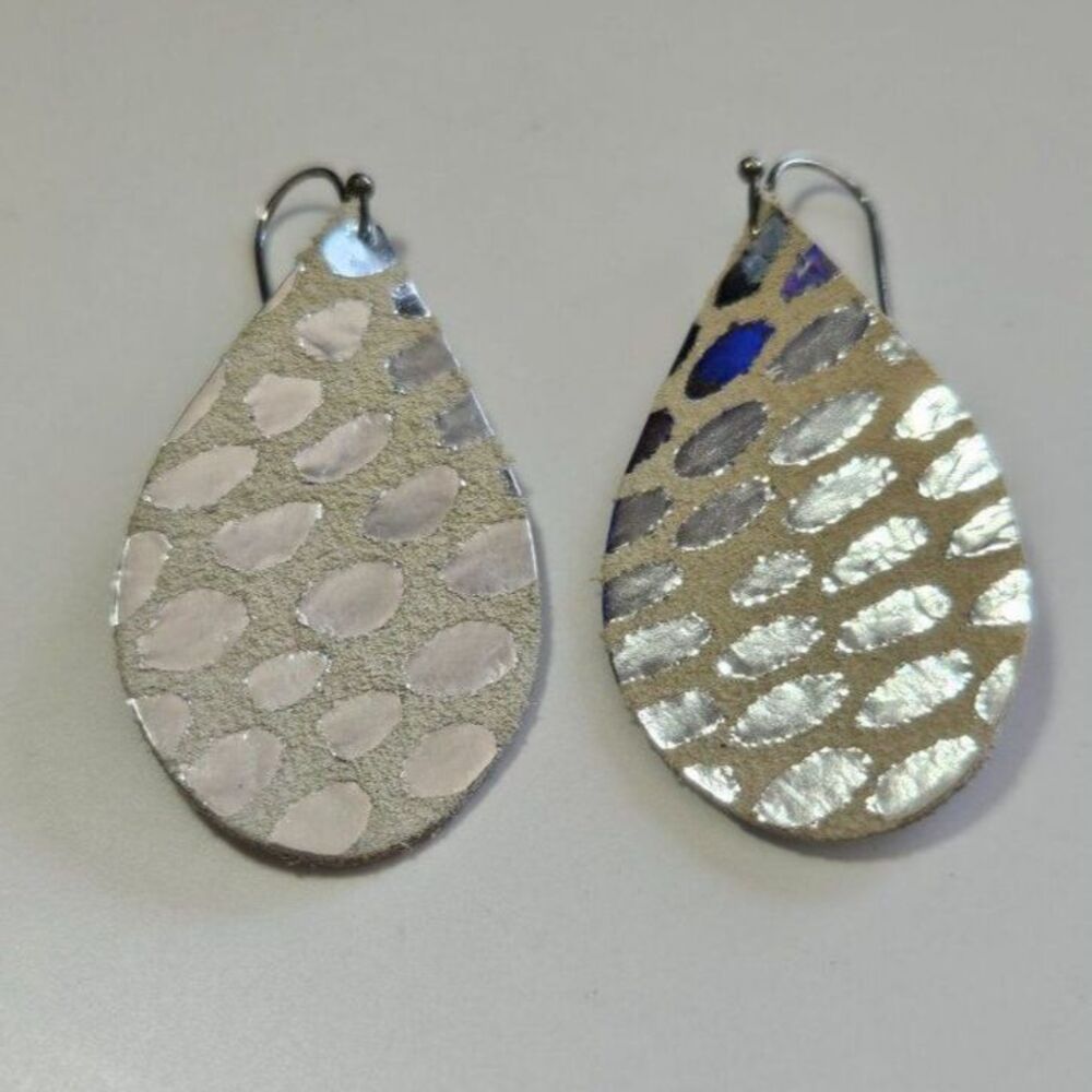 Teardrop shaped leather and silver tone earrings